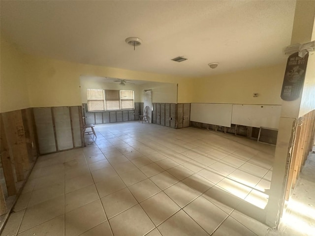 134 Peace Island Dr, Punta Gorda, FL 33950 - empty room with a ceiling fan, visible vents, and light tile patterned floors