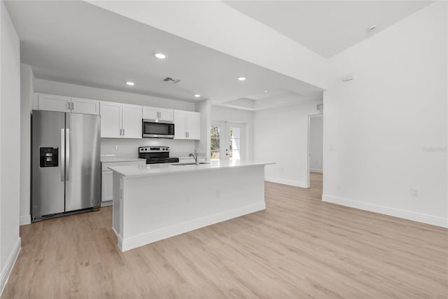 2300 Nordendale Blvd, North Port, FL 34288 - kitchen with stainless steel appliances, light wood finished floors, baseboards, light countertops, and recessed lighting