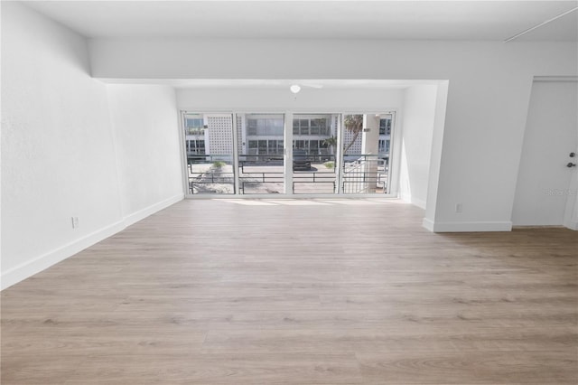 6500 Estero Blvd Unit F116, Fort Myers Beach, FL 33931 - spare room with baseboards and light wood-style floors