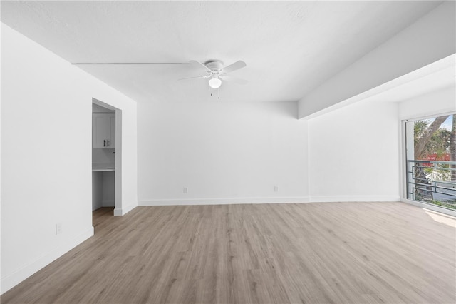 6500 Estero Blvd Unit F116, Fort Myers Beach, FL 33931 - empty room with ceiling fan and light wood-style floors