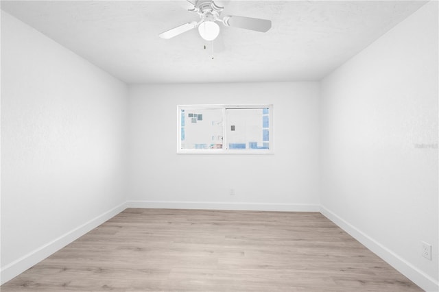 6500 Estero Blvd Unit F116, Fort Myers Beach, FL 33931 - empty room featuring light wood-style flooring and a ceiling fan