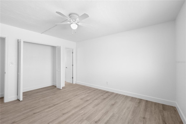 6500 Estero Blvd Unit F116, Fort Myers Beach, FL 33931 - unfurnished bedroom with light wood finished floors, a closet, and ceiling fan