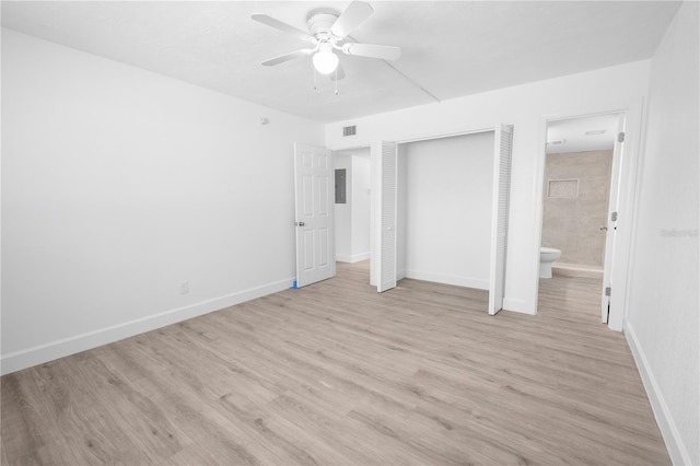 6500 Estero Blvd Unit F116, Fort Myers Beach, FL 33931 - unfurnished bedroom featuring light wood-style floors, ensuite bathroom, a closet, and ceiling fan