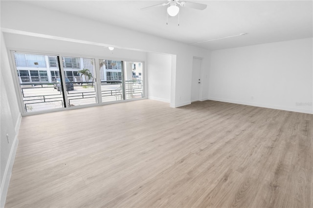 6500 Estero Blvd Unit F116, Fort Myers Beach, FL 33931 - unfurnished room featuring a ceiling fan and light wood-style flooring