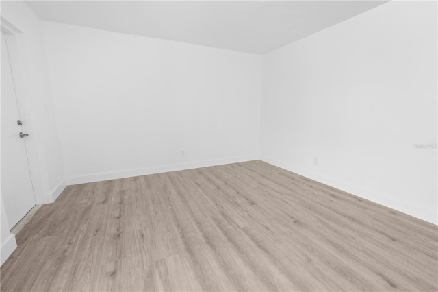 6500 Estero Blvd Unit F116, Fort Myers Beach, FL 33931 - unfurnished room featuring light wood-type flooring and baseboards