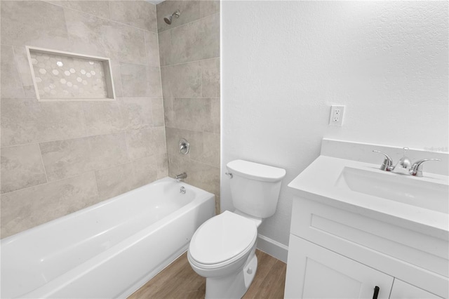 6500 Estero Blvd Unit F116, Fort Myers Beach, FL 33931 - full bath with wood finished floors, vanity, and shower / bathtub combination