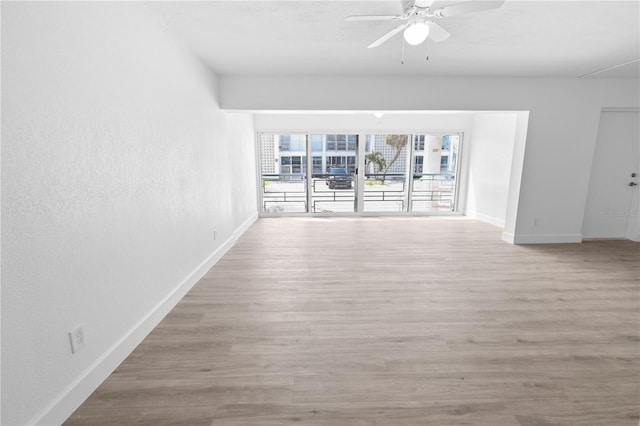 6500 Estero Blvd Unit F116, Fort Myers Beach, FL 33931 - spare room with a ceiling fan and wood finished floors
