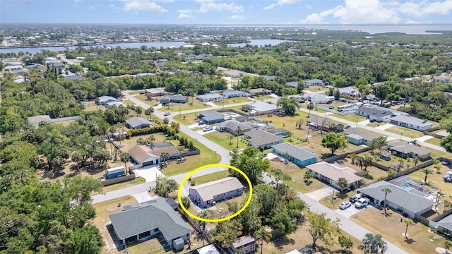 402 Cicero St NW, Port Charlotte, FL 33948 - aerial view with a water view and a residential view
