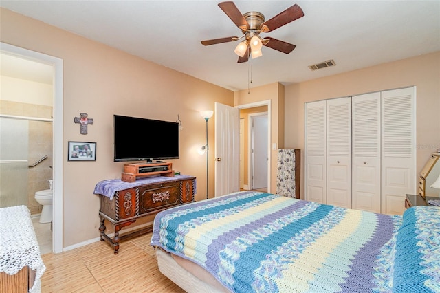 402 Cicero St NW, Port Charlotte, FL 33948 - bedroom with a closet, tile patterned flooring, baseboards, visible vents, and ceiling fan