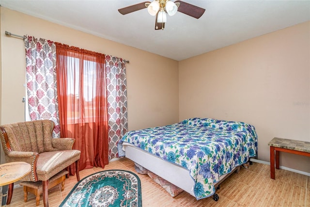 402 Cicero St NW, Port Charlotte, FL 33948 - bedroom featuring baseboards and ceiling fan