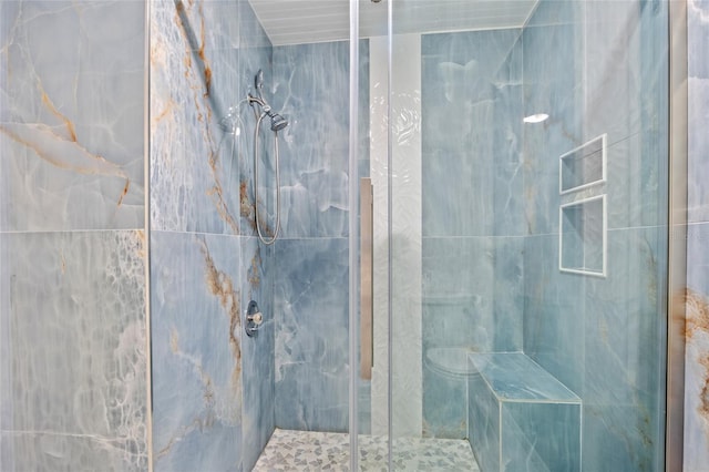 full bathroom featuring a stall shower