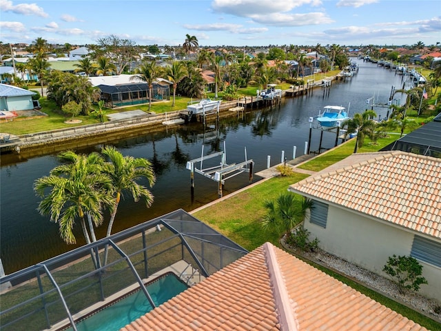 bird's eye view featuring a residential view and a water view