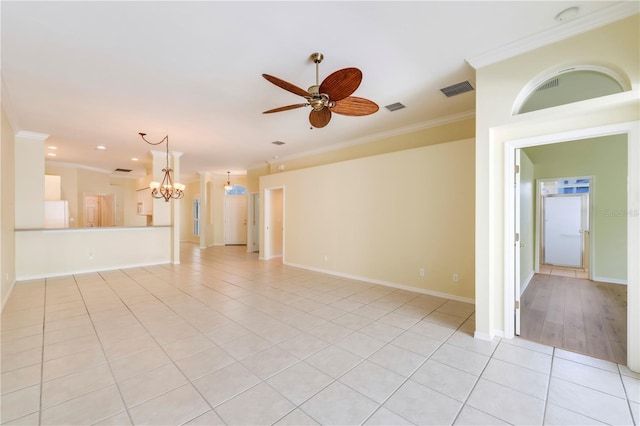 11291 Wine Palm Rd, Fort Myers, FL 33966 - unfurnished living room featuring visible vents, baseboards, ornamental molding, ceiling fan with notable chandelier, and light tile patterned floors
