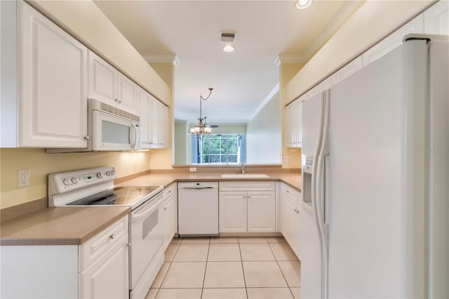 11291 Wine Palm Rd, Fort Myers, FL 33966 - kitchen featuring light tile patterned flooring, visible vents, white appliances, ornamental molding, and a sink