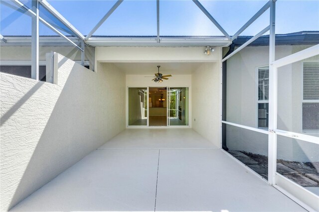 11291 Wine Palm Rd, Fort Myers, FL 33966 - view of patio / terrace with glass enclosure and ceiling fan