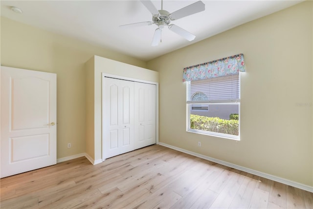 11291 Wine Palm Rd, Fort Myers, FL 33966 - unfurnished bedroom featuring baseboards, light wood-type flooring, a closet, and ceiling fan