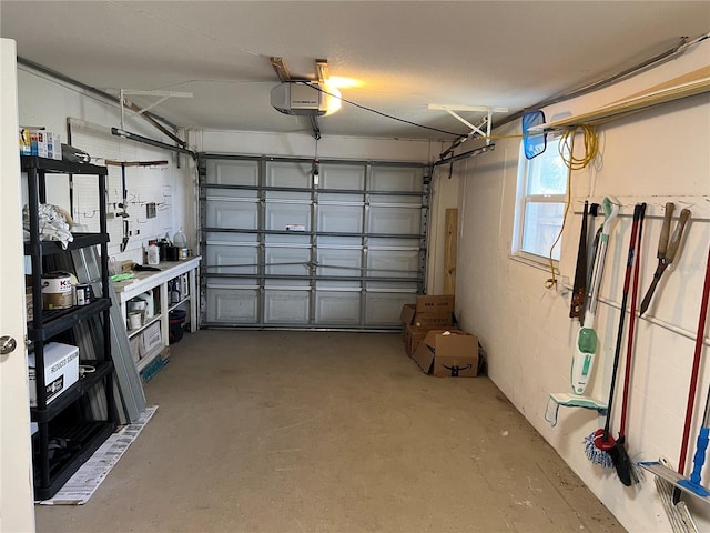 garage featuring a garage door opener