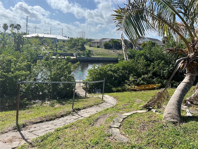 view of yard with a water view