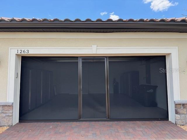 1263 Cicely Ct, North Port, FL 34289 - garage with driveway