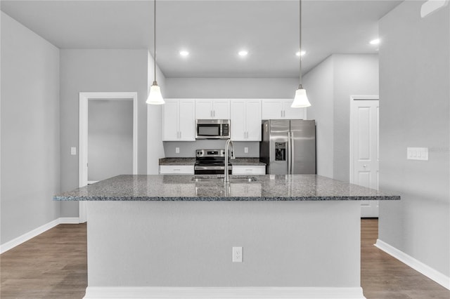 20241 Lorette Ave, Port Charlotte, FL 33954 - kitchen with dark wood finished floors, white cabinetry, a sink, and appliances with stainless steel finishes