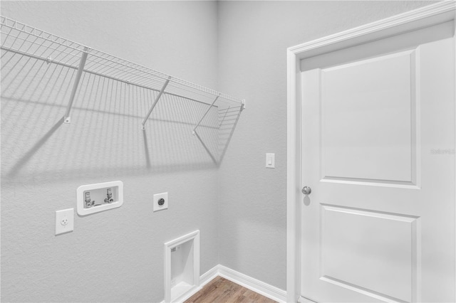 20241 Lorette Ave, Port Charlotte, FL 33954 - laundry room with hookup for an electric dryer, baseboards, laundry area, hookup for a washing machine, and wood finished floors