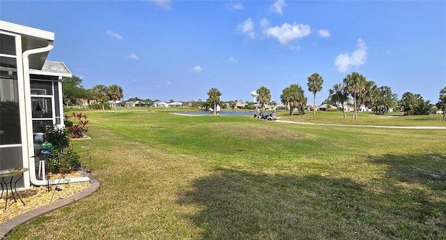 view of yard with a water view