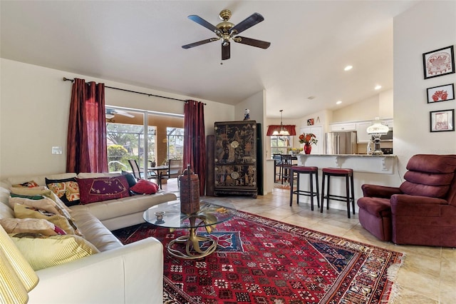 living area featuring light tile patterned floors, a ceiling fan, vaulted ceiling, and recessed lighting