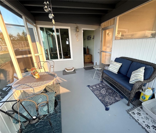 123 Poinsettia Cir NE, Port Charlotte, FL 33952 - sunroom / solarium with outdoor lounge area and beam ceiling