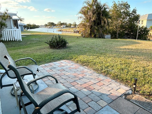 123 Poinsettia Cir NE, Port Charlotte, FL 33952 - view of patio / terrace with a water view
