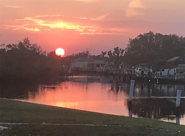 123 Poinsettia Cir NE, Port Charlotte, FL 33952 - water view featuring a dock
