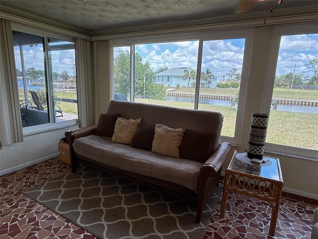 123 Poinsettia Cir NE, Port Charlotte, FL 33952 - sunroom / solarium with baseboards and a water view