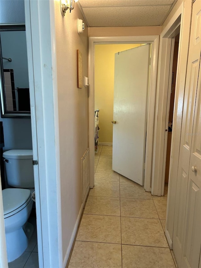 123 Poinsettia Cir NE, Port Charlotte, FL 33952 - hall featuring light tile patterned floors and baseboards