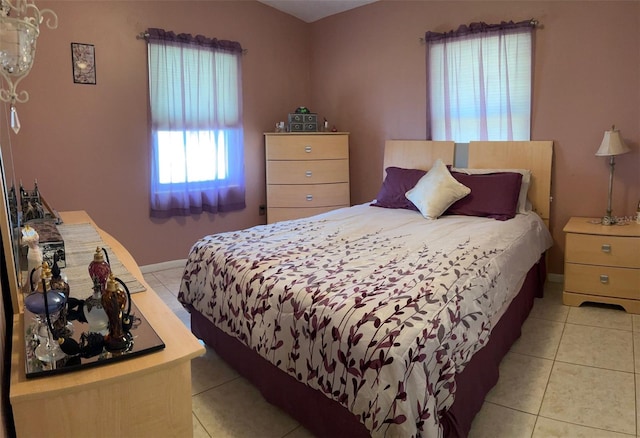 123 Poinsettia Cir NE, Port Charlotte, FL 33952 - bedroom featuring light tile patterned floors and baseboards