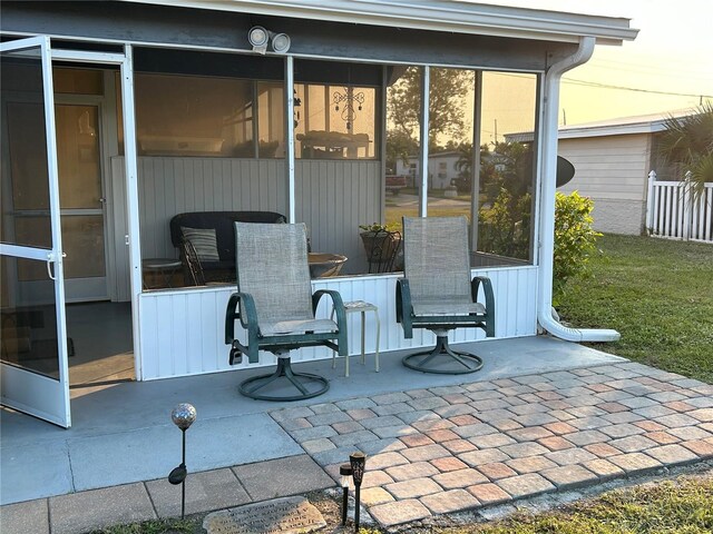 123 Poinsettia Cir NE, Port Charlotte, FL 33952 - view of patio featuring a sunroom