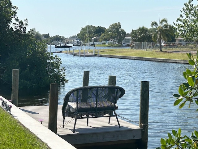 123 Poinsettia Cir NE, Port Charlotte, FL 33952 - dock featuring a water view