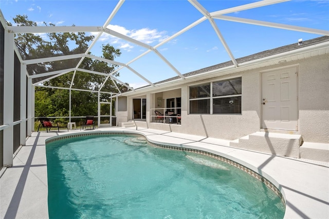 pool featuring a patio area and a lanai