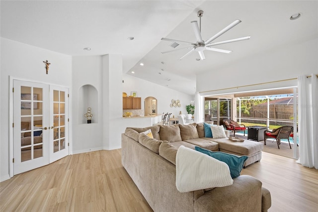 living room featuring light wood-style floors, french doors, a ceiling fan, and recessed lighting