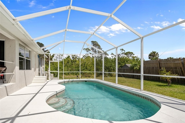 view of swimming pool with fence, a fenced in pool, a patio, and a lanai