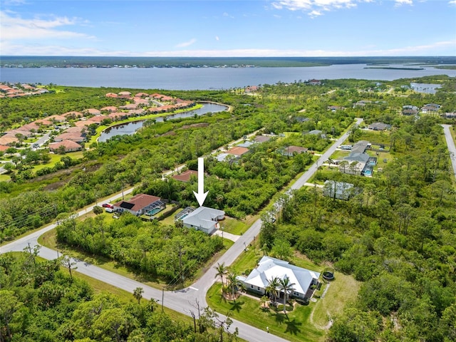aerial view featuring a residential view and a water view