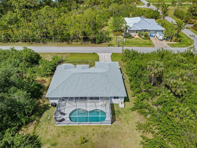 bird's eye view with a forest view
