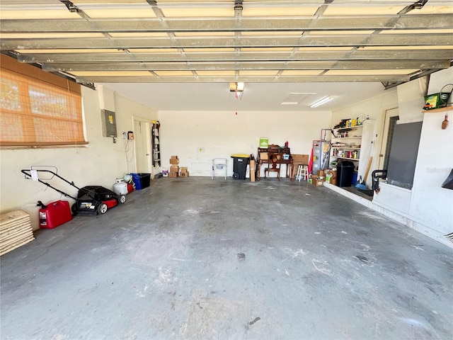 931 Juno Dr, Punta Gorda, FL 33950 - garage with electric panel and a garage door opener