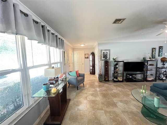 931 Juno Dr, Punta Gorda, FL 33950 - living area with healthy amount of natural light, crown molding, and ceiling fan