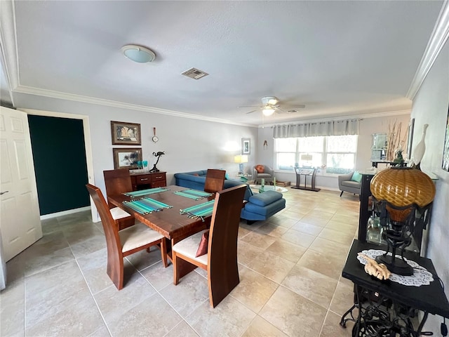 931 Juno Dr, Punta Gorda, FL 33950 - dining room featuring a ceiling fan, crown molding, and light tile patterned floors