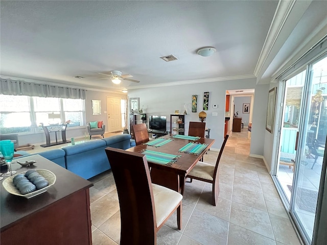 931 Juno Dr, Punta Gorda, FL 33950 - dining room with crown molding, plenty of natural light, a ceiling fan, and light tile patterned flooring
