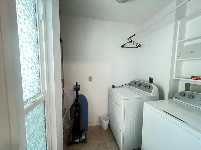 931 Juno Dr, Punta Gorda, FL 33950 - laundry area with washing machine and dryer and light tile patterned flooring