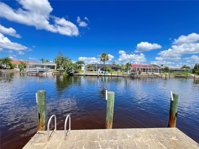 931 Juno Dr, Punta Gorda, FL 33950 - dock area featuring a water view and a residential view