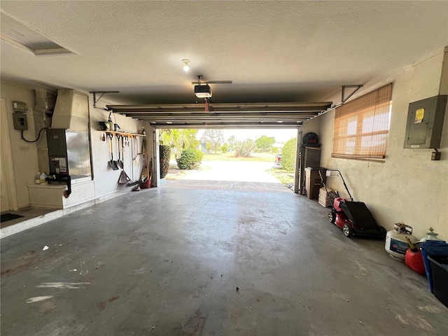 931 Juno Dr, Punta Gorda, FL 33950 - garage with a garage door opener, electric panel, and heating unit