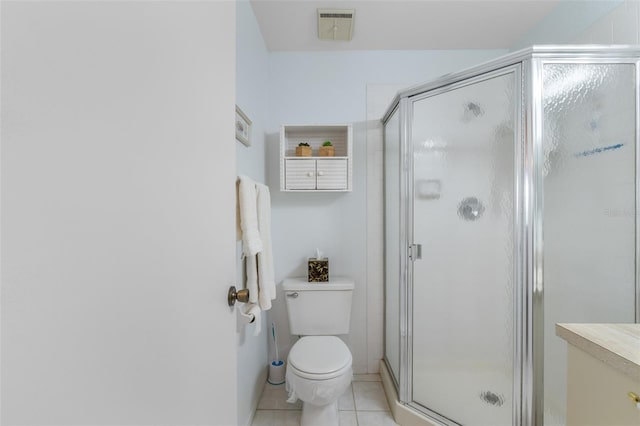 25100 Sandhill Blvd Unit R202, Punta Gorda, FL 33983 - full bath with tile patterned floors, a stall shower, toilet, and vanity