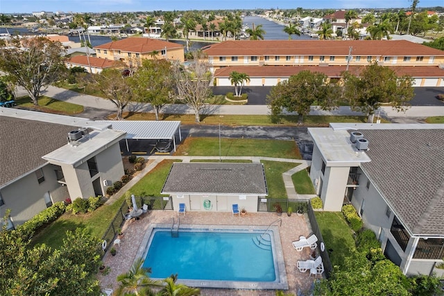 birds eye view of property with a residential view