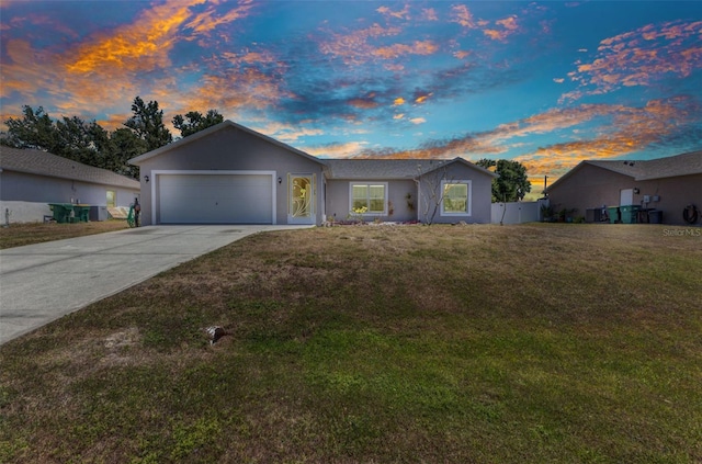 6344 Hera St, Englewood, FL 34224 - single story home featuring fence, stucco siding, concrete driveway, a front yard, and a garage